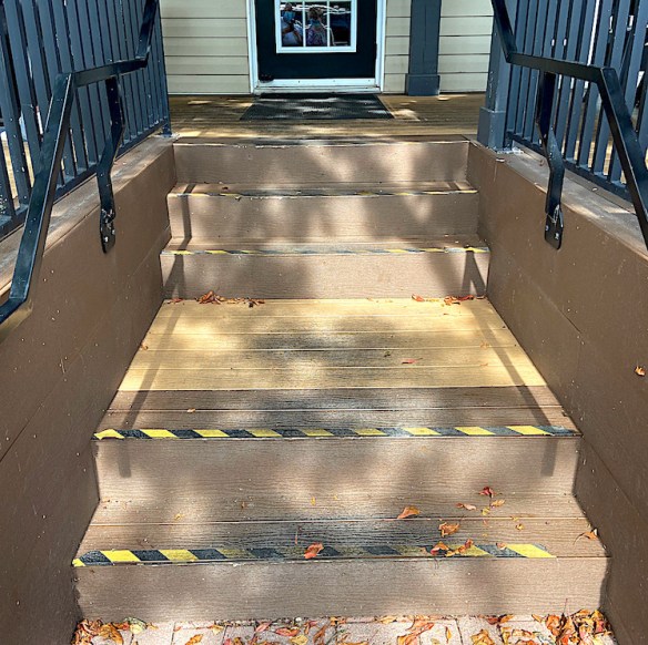 close up of stairs to pepper cat restaurant in Amherstburg, Ontario